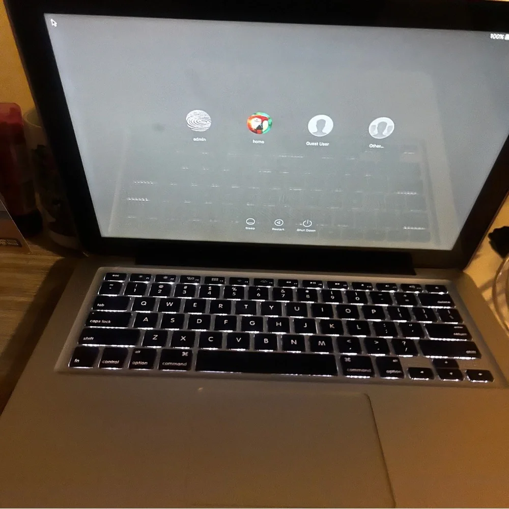 Apple MacBook with Silver Body and Black Keyboard